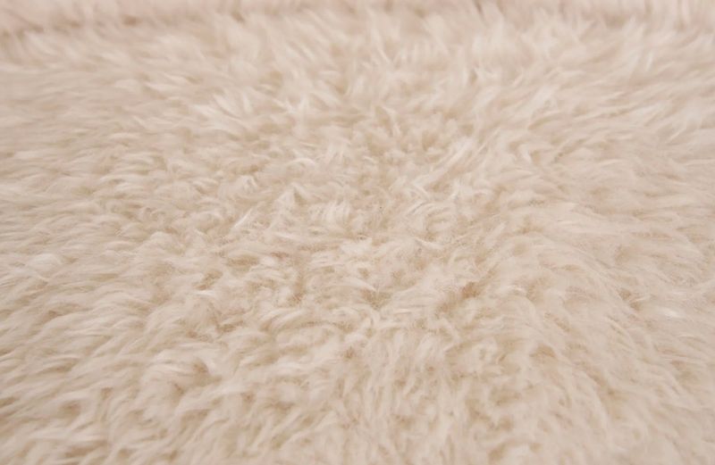 Weißer Sessel JUBI Kunstfell creme-weiß